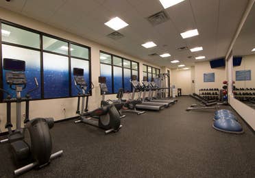 Fitness center with weights, treadmills and ellipticals at Williamsburg Resort in Virginia.