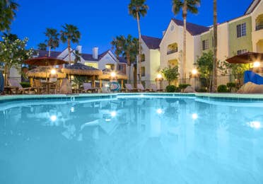 Evening views of the pool at Desert Club Resort in Las Vegas.