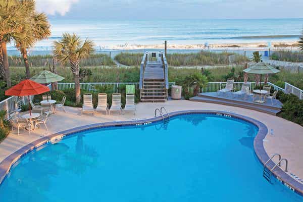 Aerial view of the pool and beach at South Beach Resort