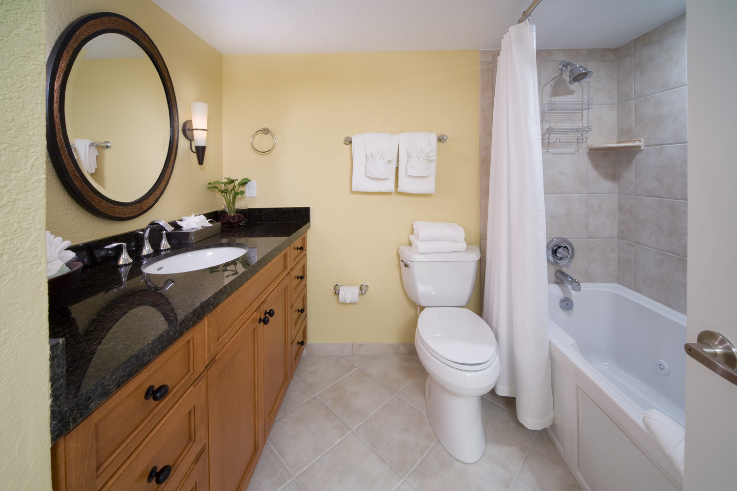 Bathroom with shower/tub combination in a studio room in West Village at Orange Lake Resort near Orlando, FL