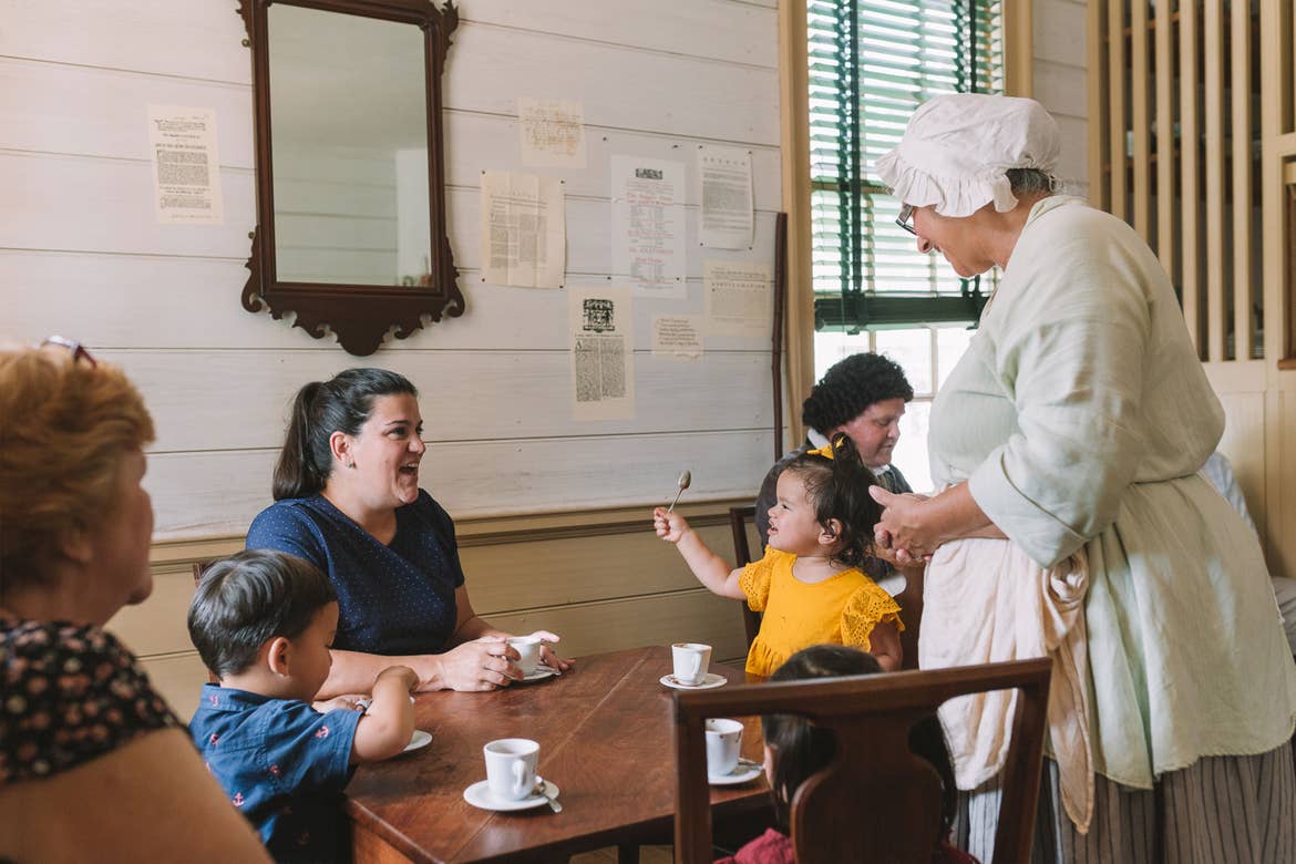 Featured Contributor, Angelica Kajiwara (left), and her family enjoy the dining experience in Williamsburg, Virginia.