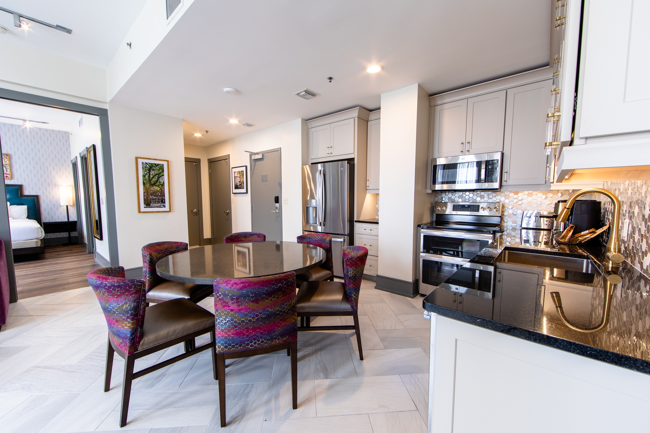 Signature Collection two bedroom villa dining area and full kitchen at New Orleans Resort in Louisiana.