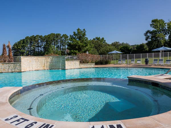 Outdoor round hot tub at Villages Resort in Flint, Texas