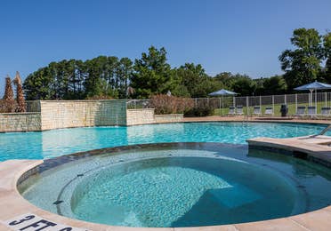 Outdoor round hot tub at Villages Resort in Flint, Texas