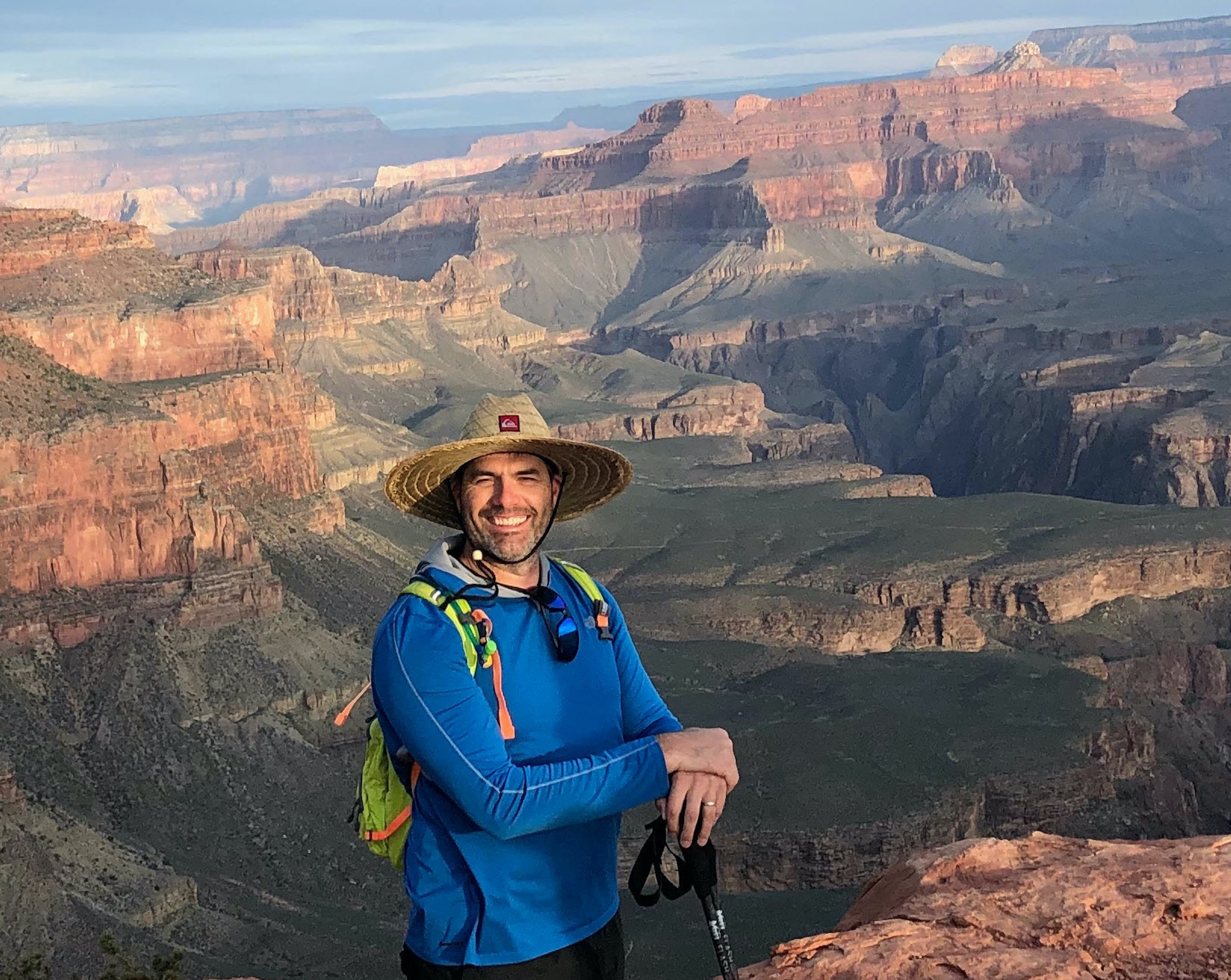 Jeff in front of the beautiful, mountainous Grand Canyon landscape.