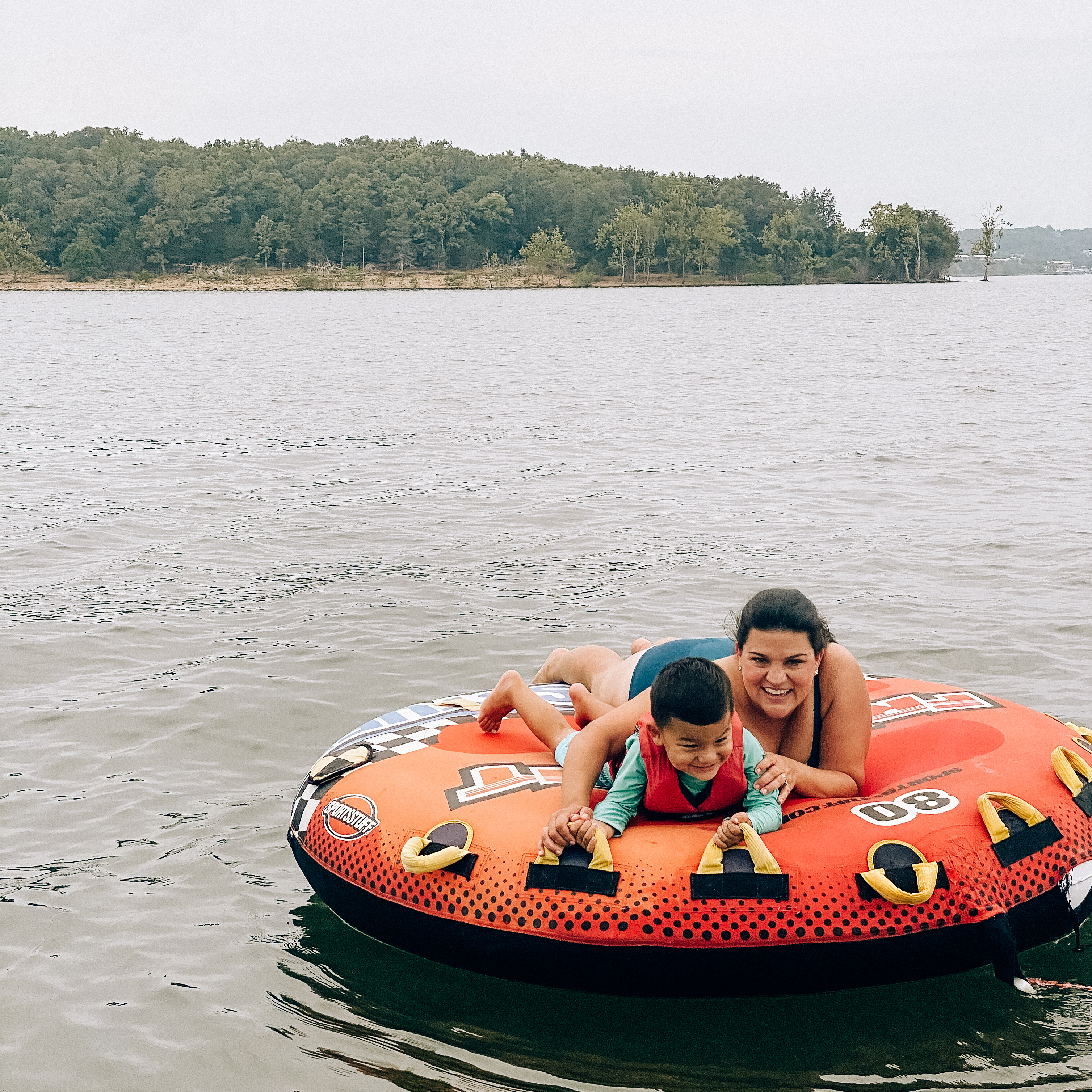 Angelica and her son tubing