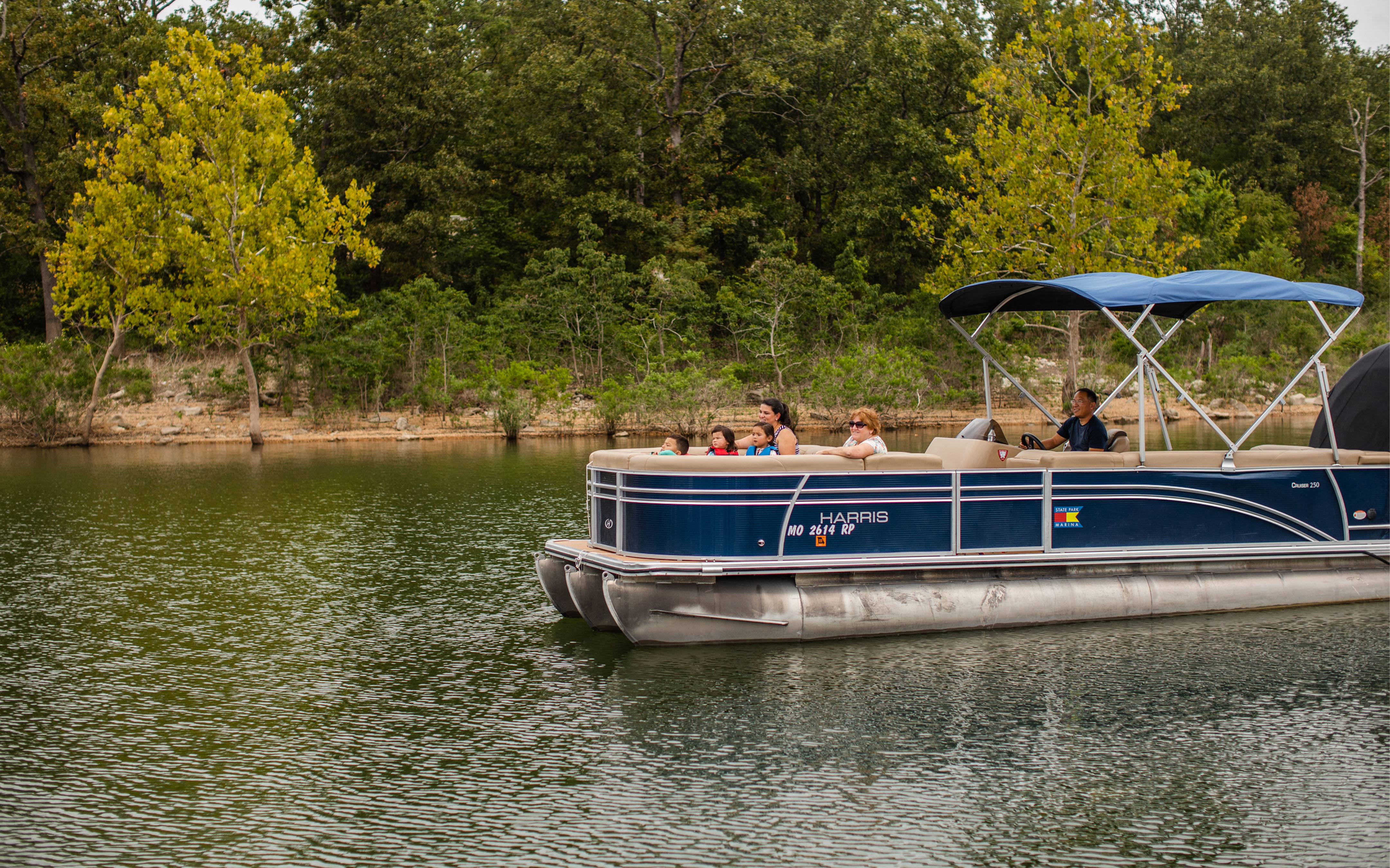 Boat on catch-and-release pond at Holiday Hills Resort in Branson, Missouri.