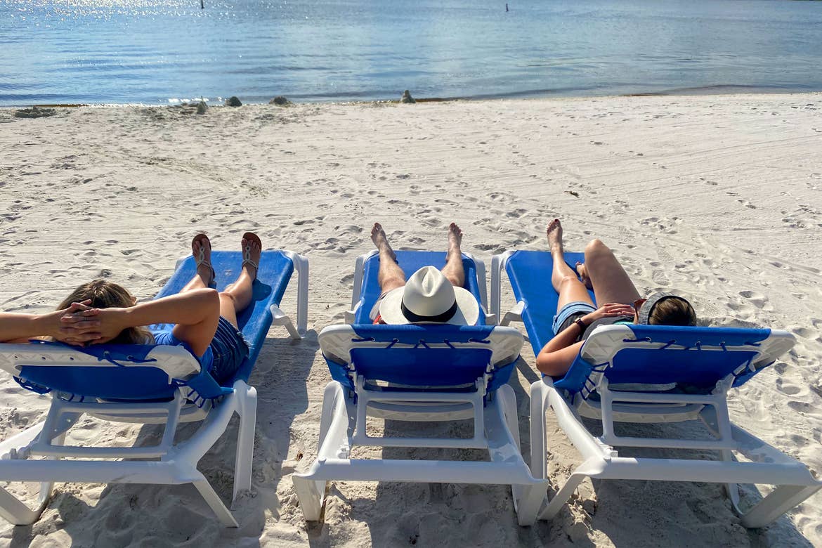 Featured Contributor, Angie Orth's three friends pose on the sands at our Orange Lake resort in Orlando, Florida.