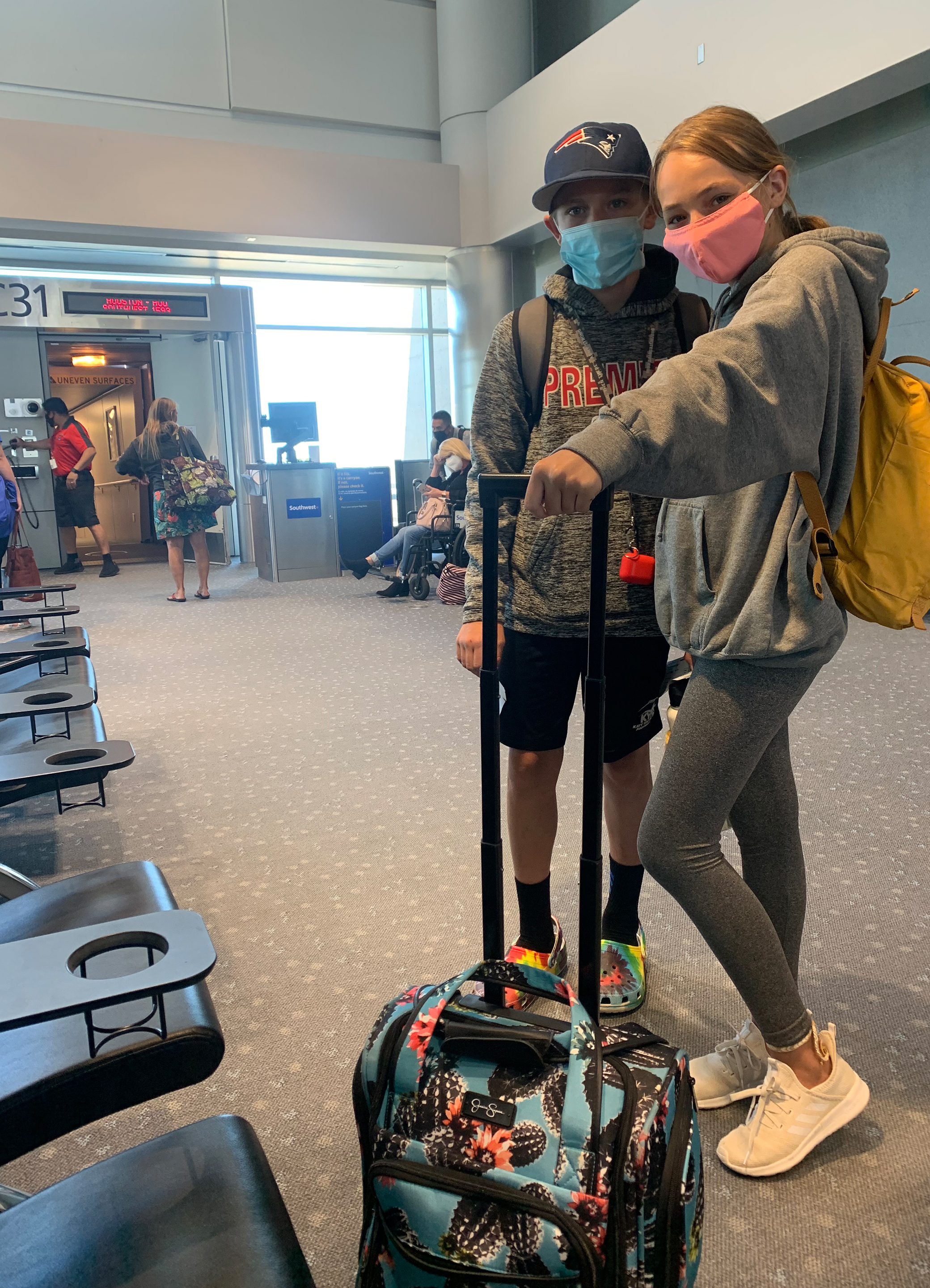 Ashley's kids waiting to board