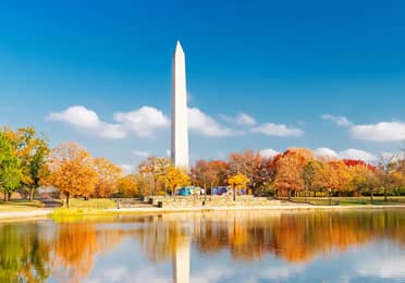 Washington Monument reflected in the National Mall pond during autumn in Washington, D.C.