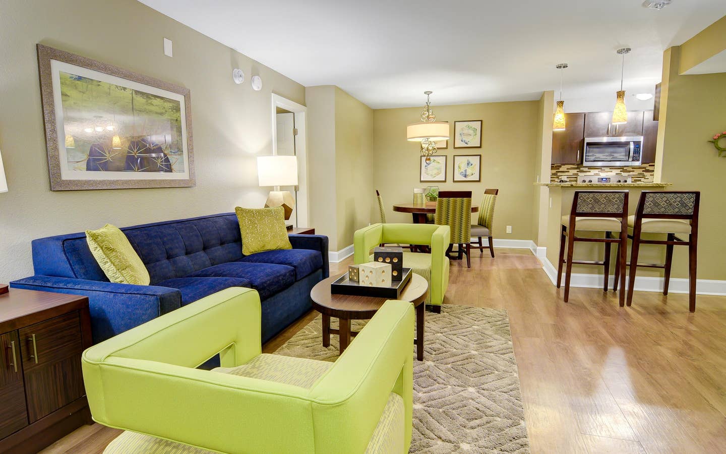 Living room and dining area in a two-bedroom villa at Desert Club Resort in Las Vegas