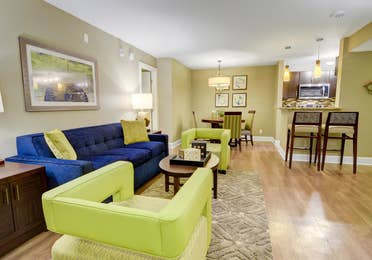 Living room and dining area in a two-bedroom villa at Desert Club Resort in Las Vegas