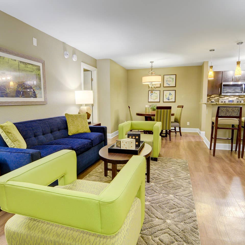 Living room and dining area in a two-bedroom villa at Desert Club Resort in Las Vegas