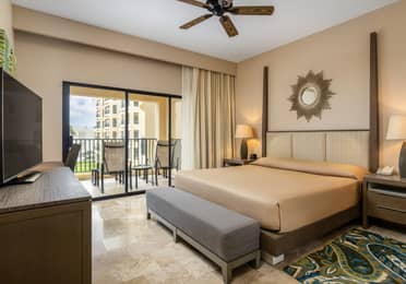 Serene oceanview bedroom with a private balcony.