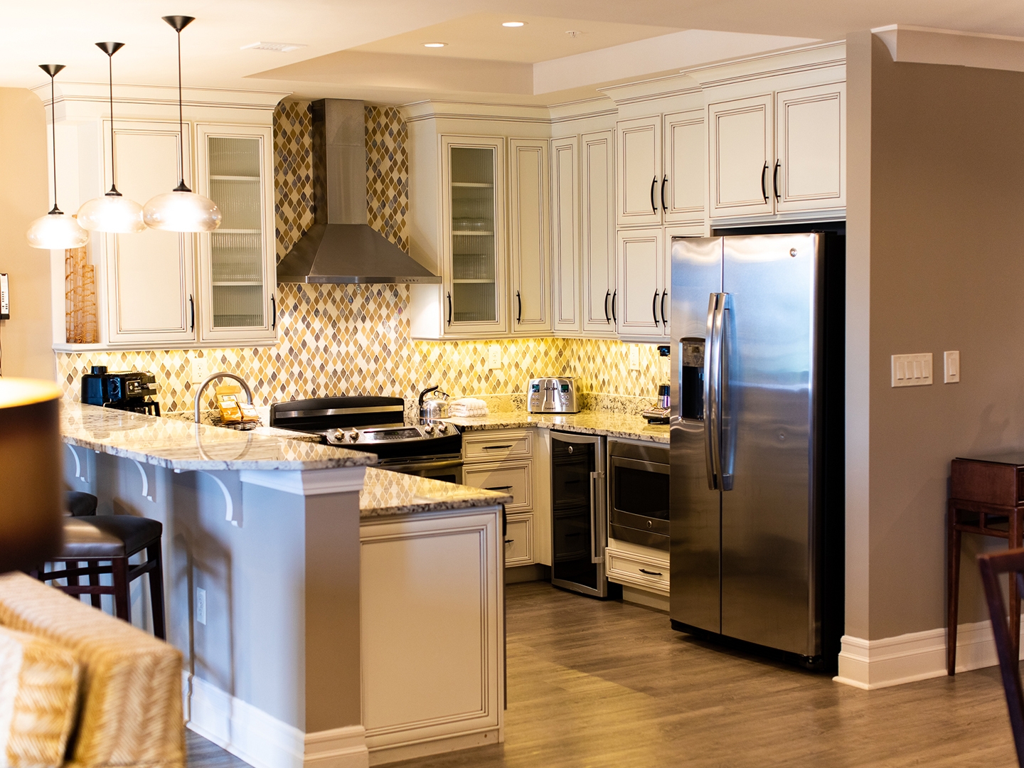 Full kitchen with stainless steel appliances in a four-bedroom Signature Collection villa at South Beach Resort in Myrtle Beach, South Carolina.