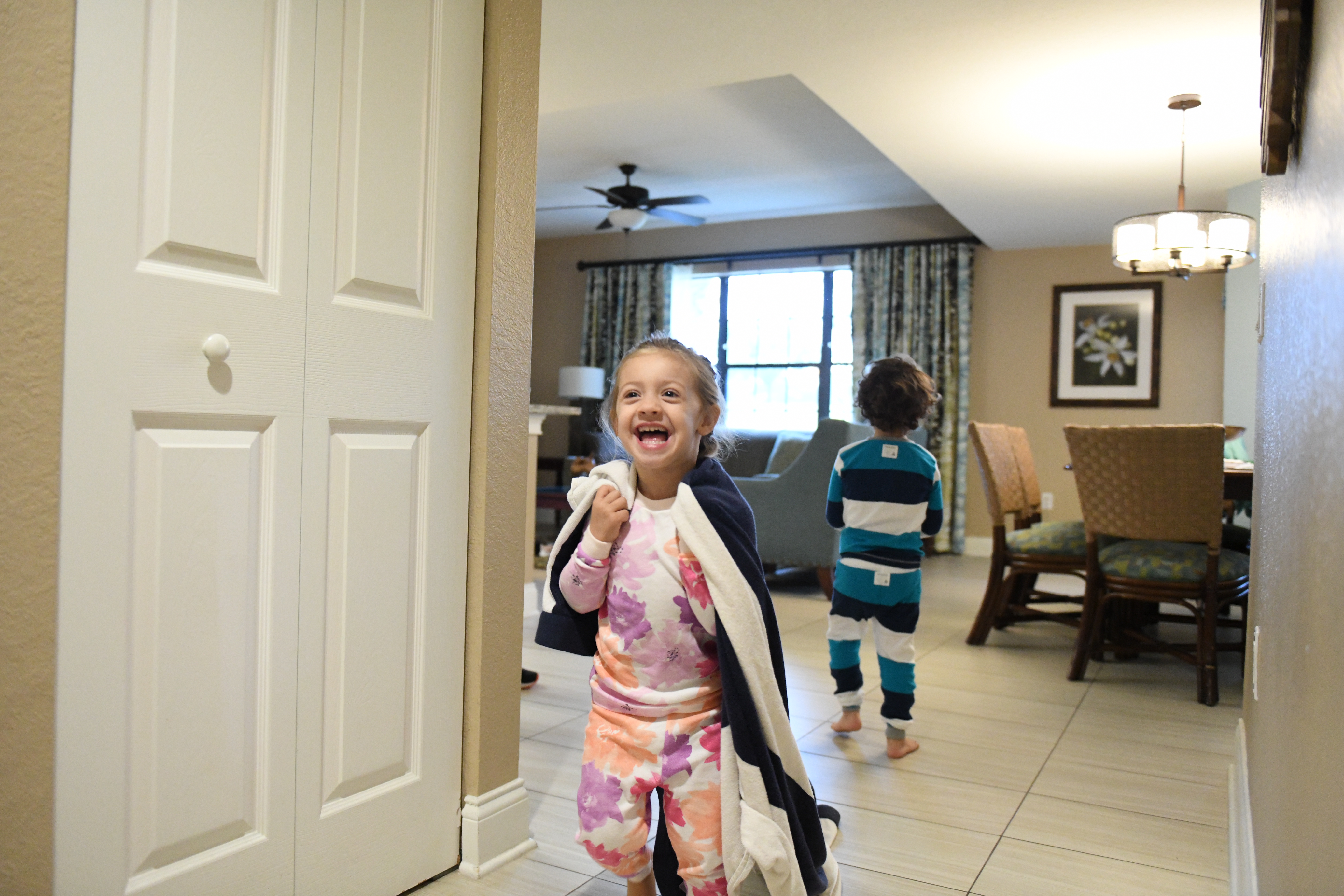 Lola wearing a towel like a cape