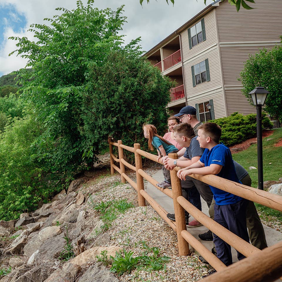 Family enjoying the outdoors at Oak n' Spruce Resort in South Lee, Massachusetts.
