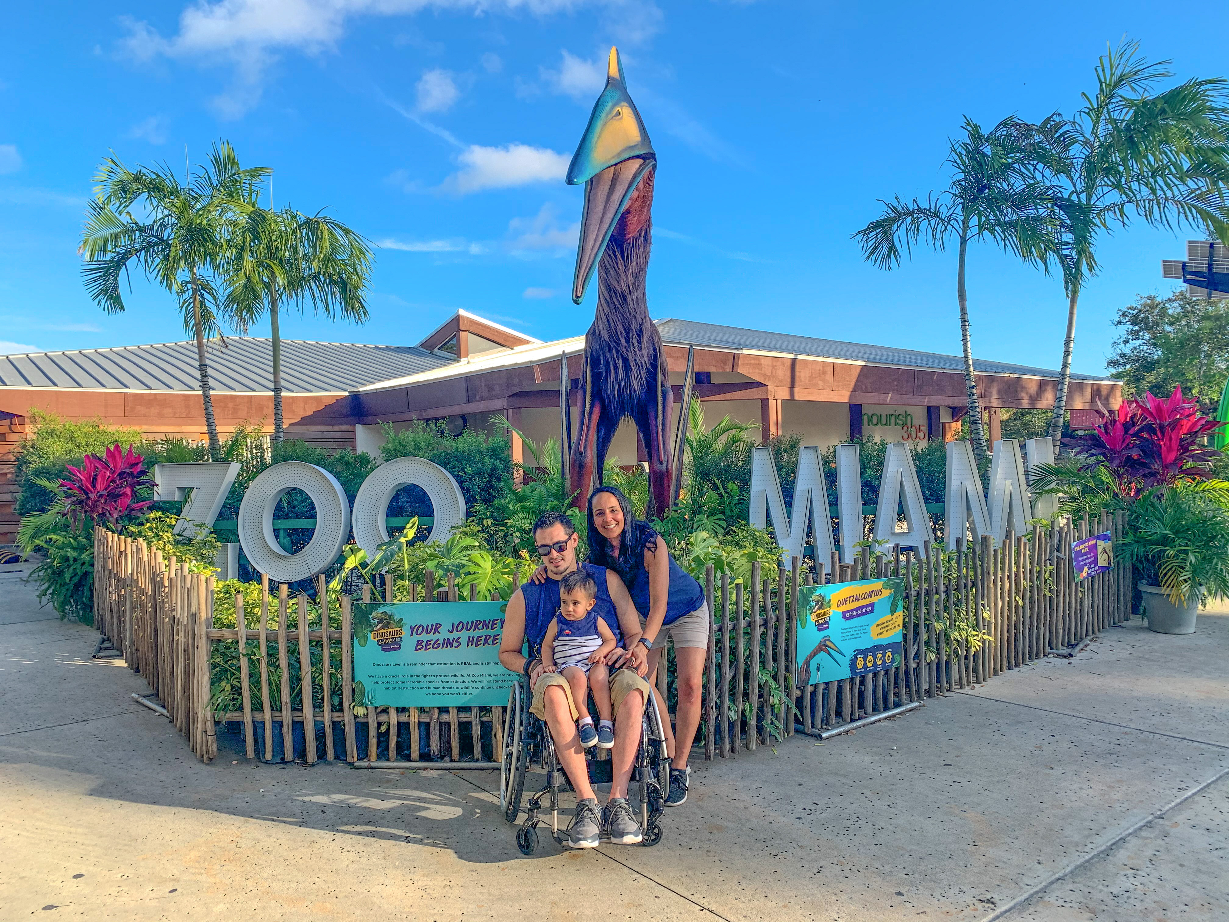 Danny and his family in front of the Zoo Miami sign