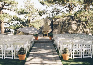White chairs set up for a wedding ceremony