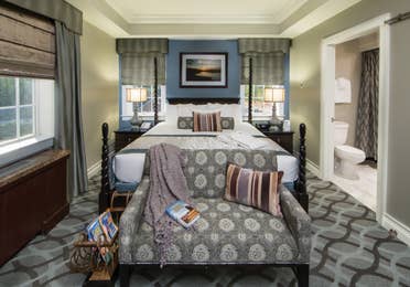 Master bedroom in a Signature Collection villa at Williamsburg Resort