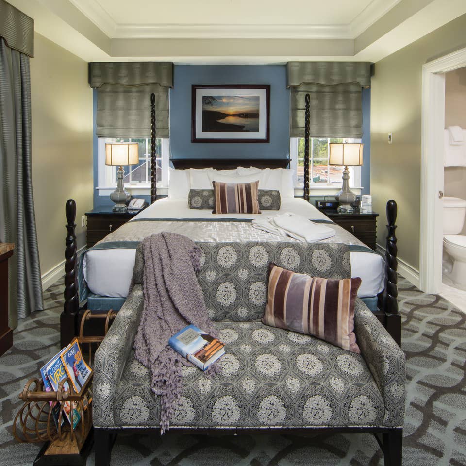 Master bedroom in a Signature Collection villa at Williamsburg Resort