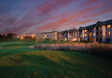 View of golf course and property buildings at Lake Geneva Resort