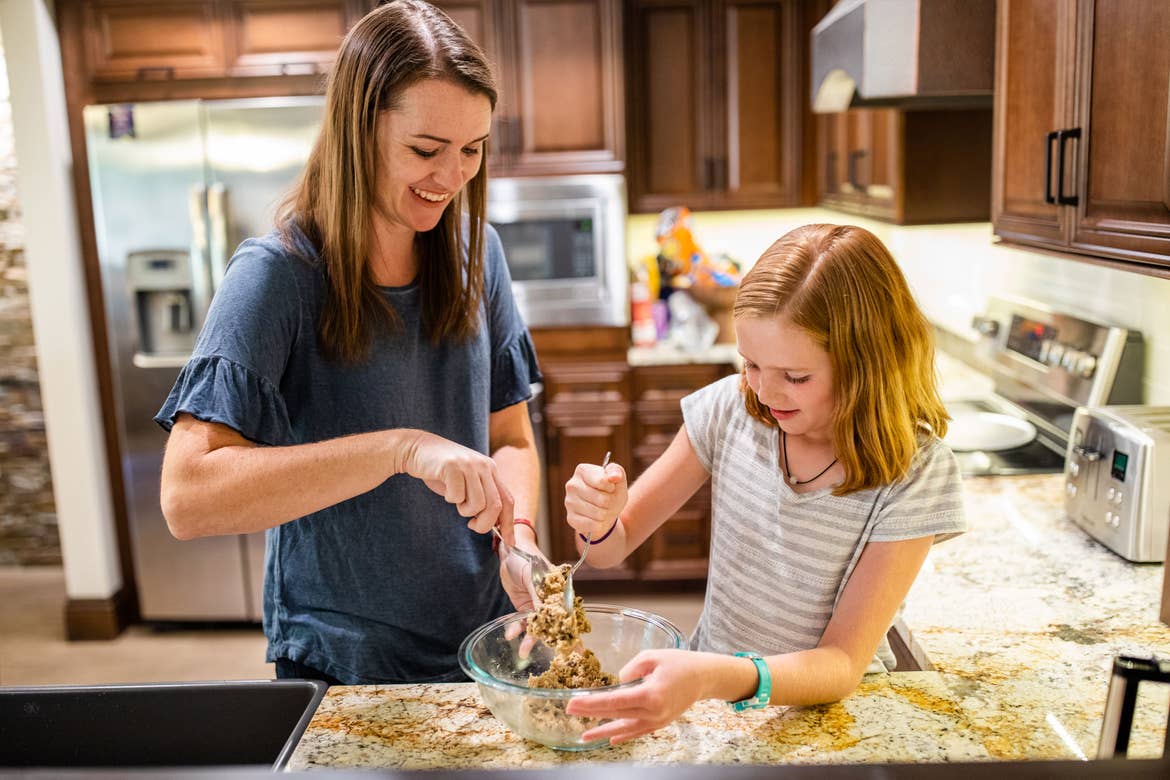 Author Jessica Averett (left) and her daughter (right) bake cookies in our Scottsdale Resort Villa kitchen.