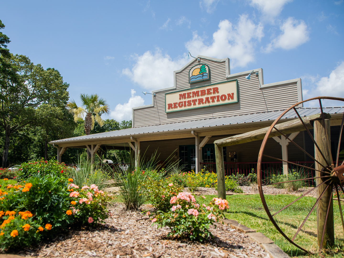 Exterior shot of lobby building at Villages Resort in Flint, Texas.