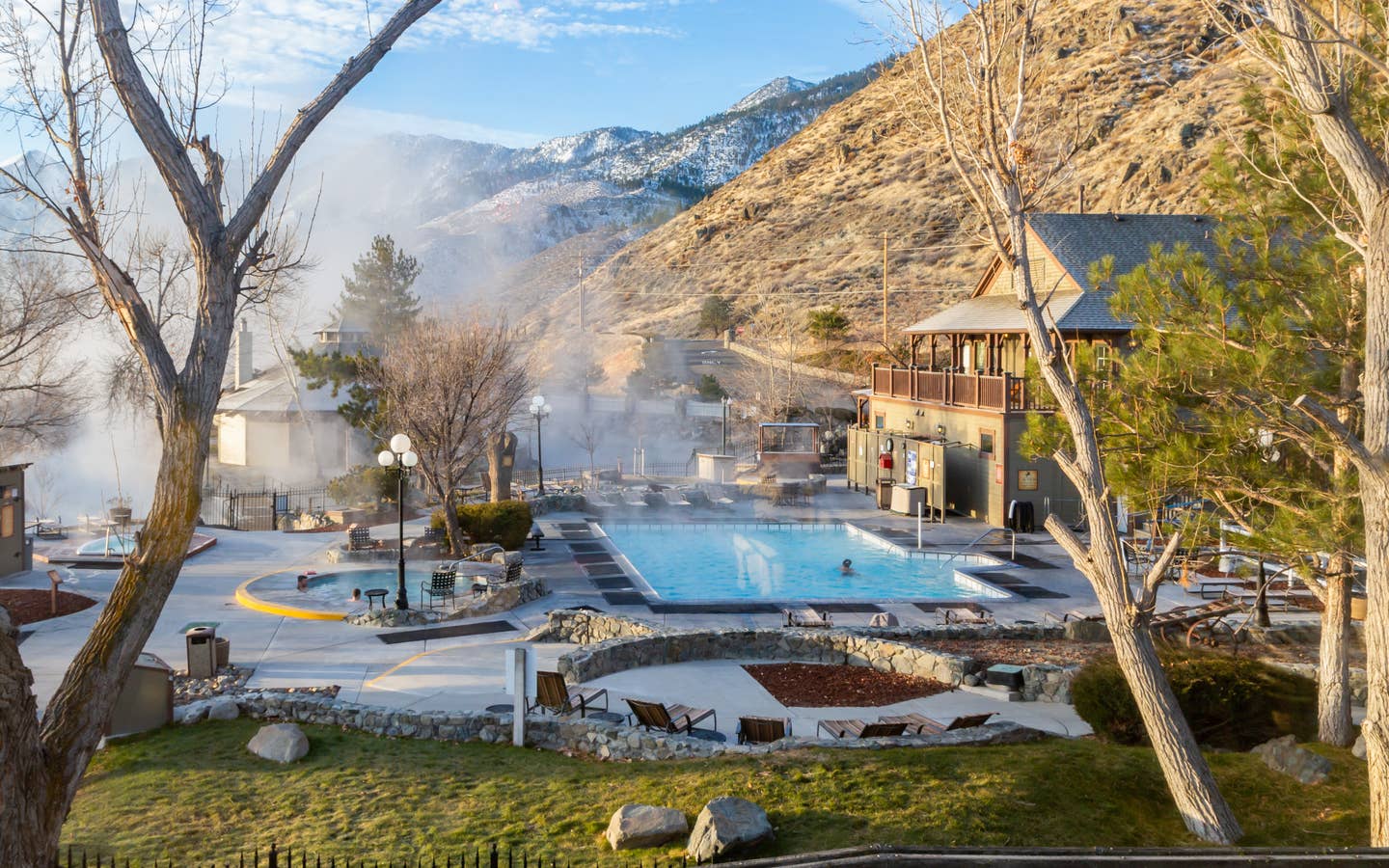 View of outdoor pool and hot springs spa tubs at David Walley's Resort in Genoa, Nevada