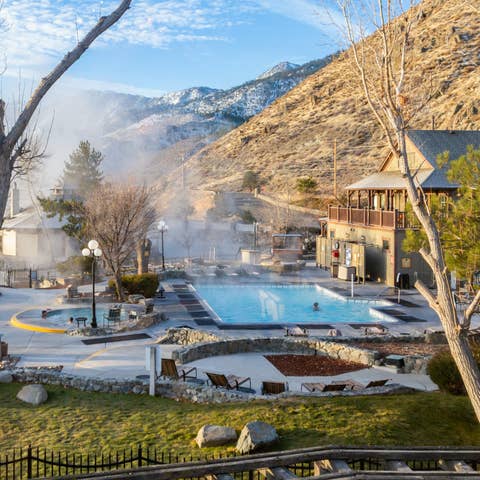 View of outdoor pool and hot springs spa tubs at David Walley's Resort in Genoa, Nevada