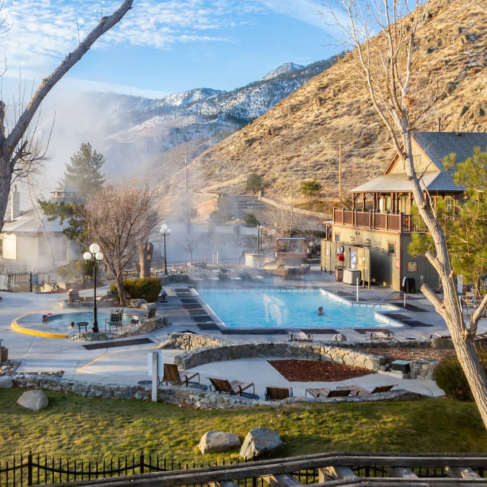 View of outdoor pool and hot springs spa tubs at David Walley's Resort in Genoa, Nevada