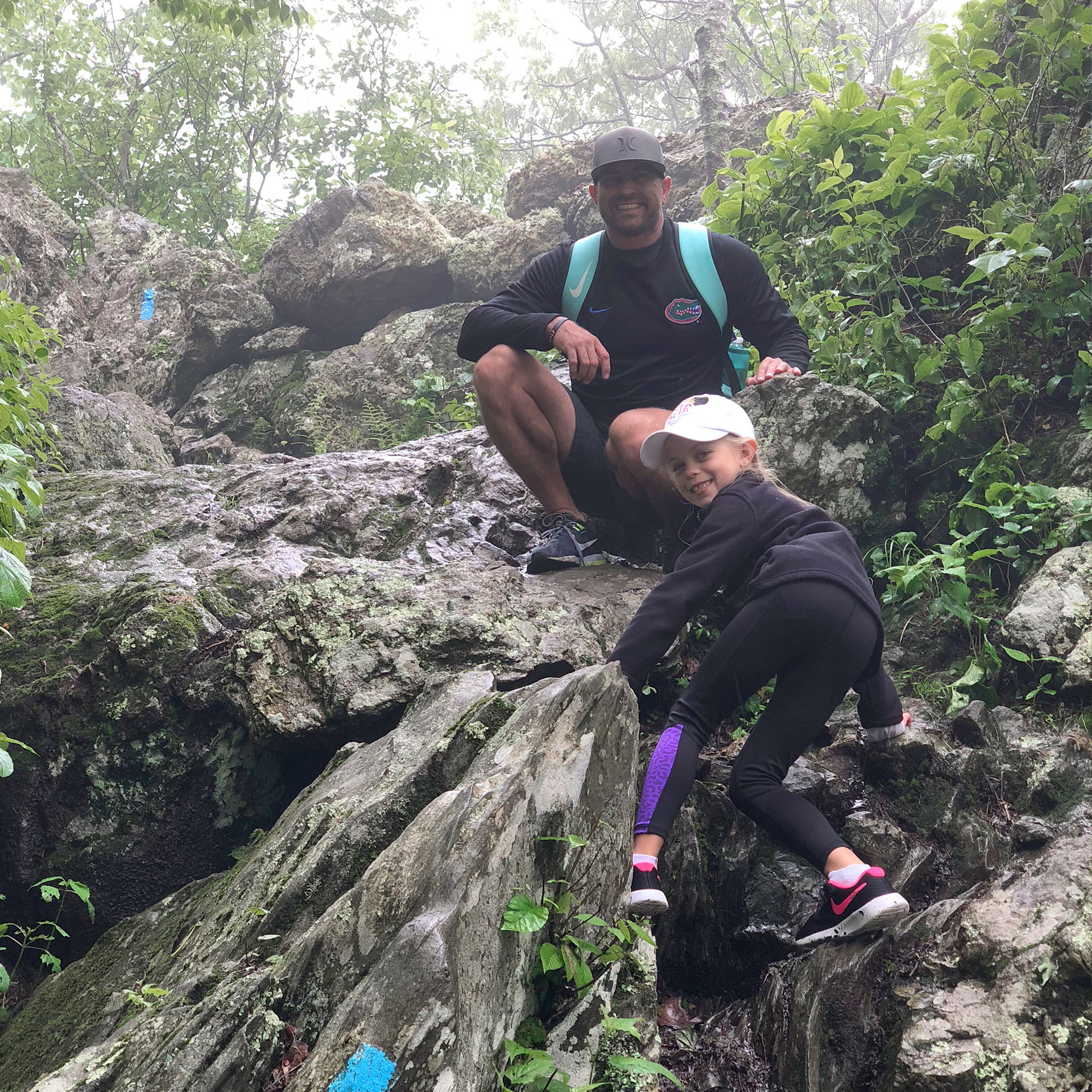 Author, Chris Johnstons' husband, Josh (top),  and daughter, Kyndall (bottom), climb rock scrambles on the Bearfence Mountain Trail at Shenandoah National Park in Virginia.