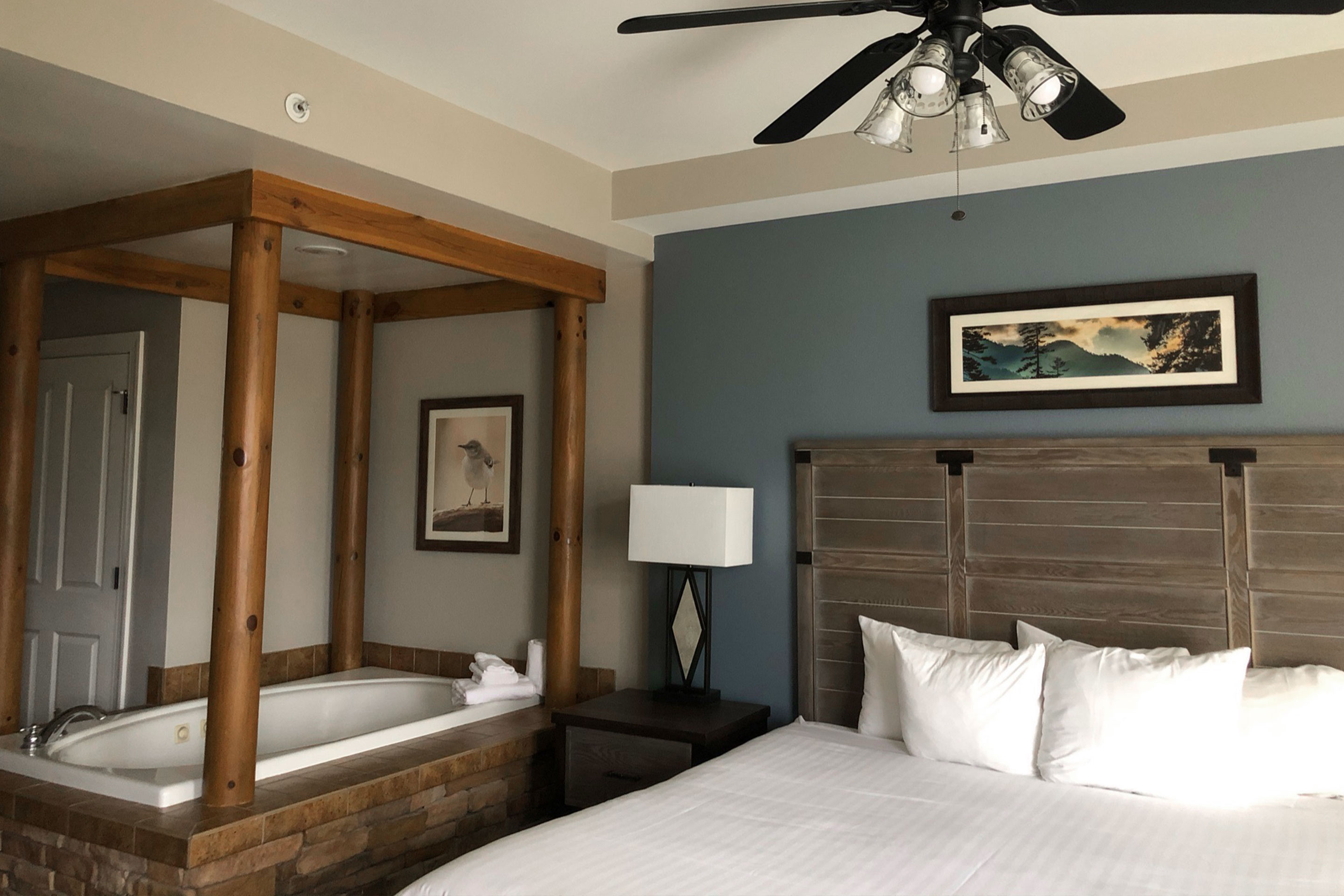 The Master bed and bathtub in our two-bedroom villa at Smoky Mountain Resort.