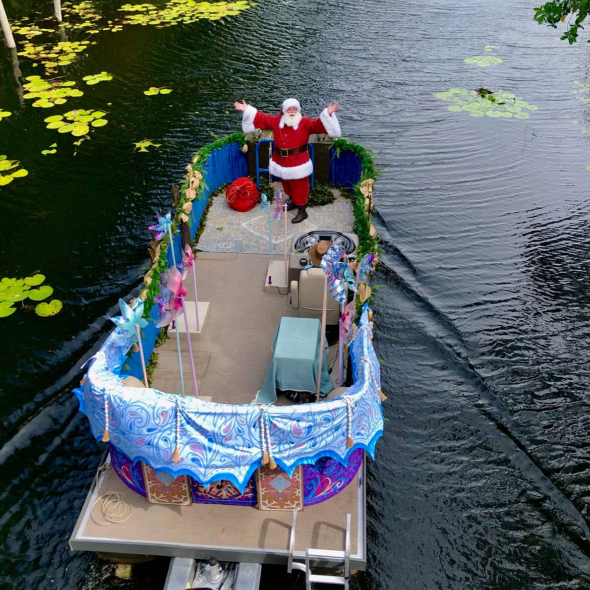 Santa Claus' Festive Flotilla at Disney's Animal Kingdom Theme Park at Walt Disney World® Resort.
