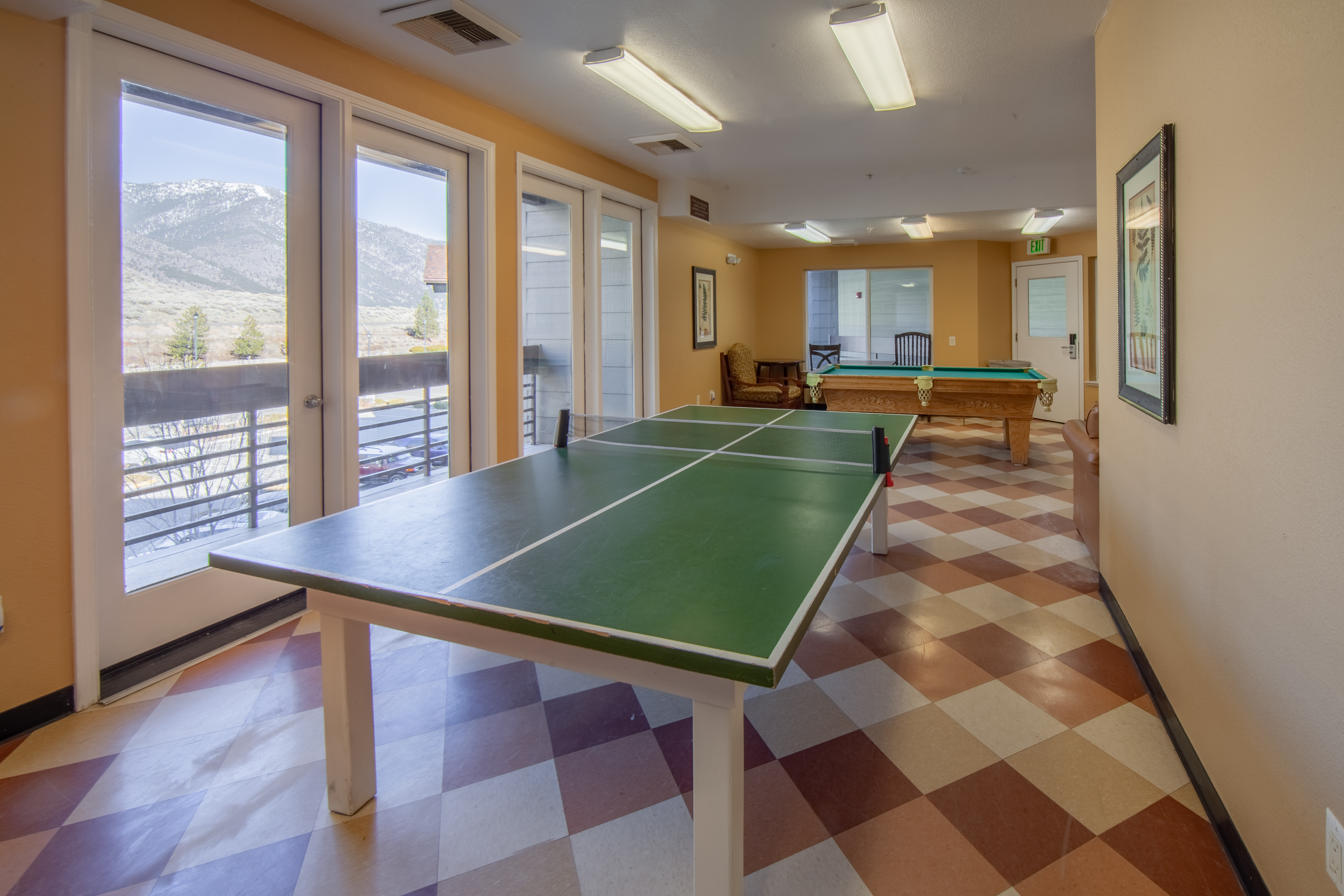 Game room with ping pong table and pool table at David Walley's Resort in Genoa, Nevada.