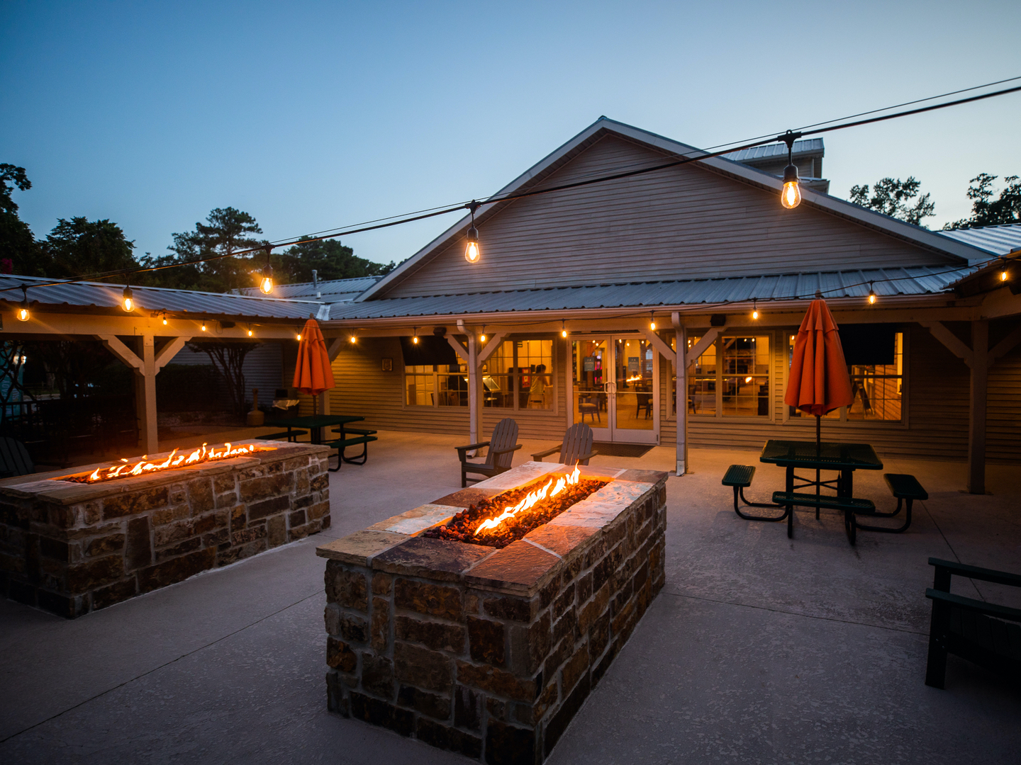 Fire pits outside the Activity Center at Villages Resort in Flint, Texas.