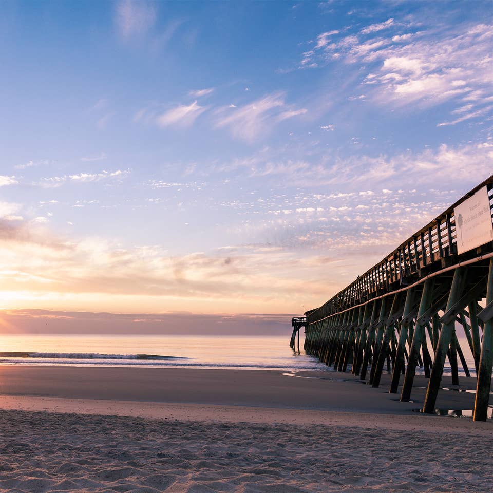 The sun sets near the Pier at Myrtle Beach, South Carolina.