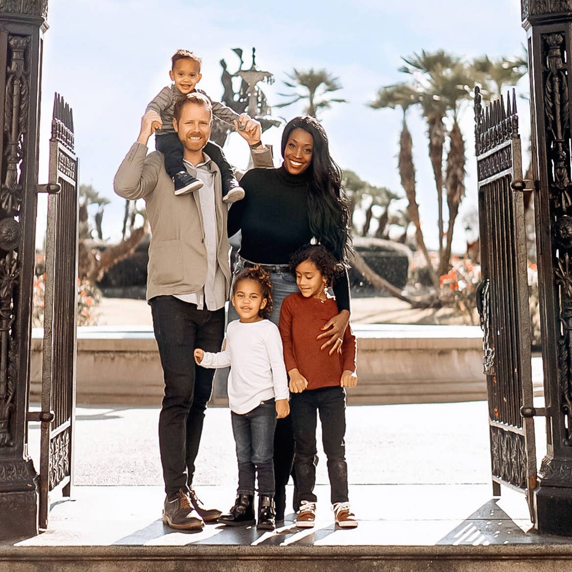 Featured Contributor, Sally Butan of @butanclan (top-right) stands with her husband, Kevin (top-left), and their children pose in Jackson Square of New Orleans, Louisiana.
