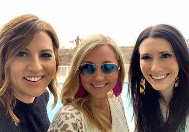 Featured Contributor, Amanda Nall (middle) poses with her two friends on the beach near our Galveston Beach Resort in Galveston, Tx.