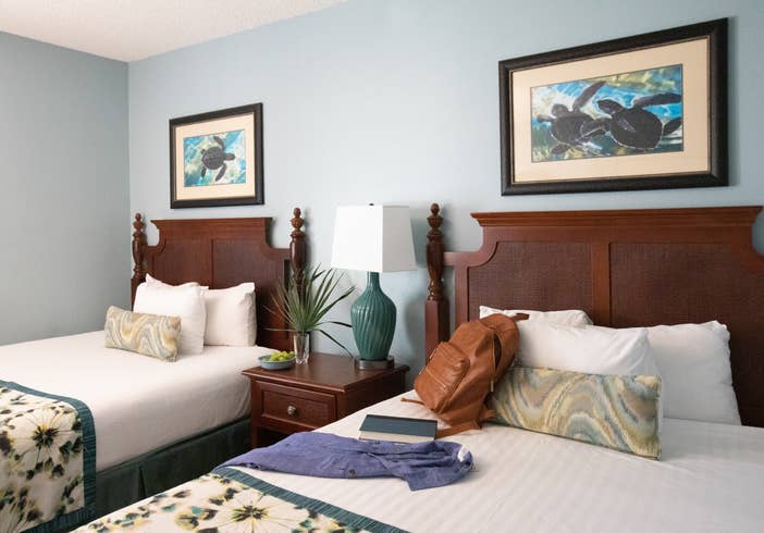 Bedroom with two beds in a villa in East Village at Orange Lake Resort near Orlando, Florida