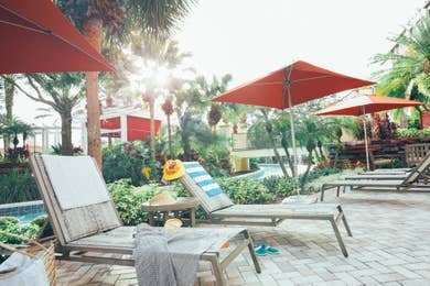 Beach chairs next to a pool at Orange Lake Resort near Orlando, Florida