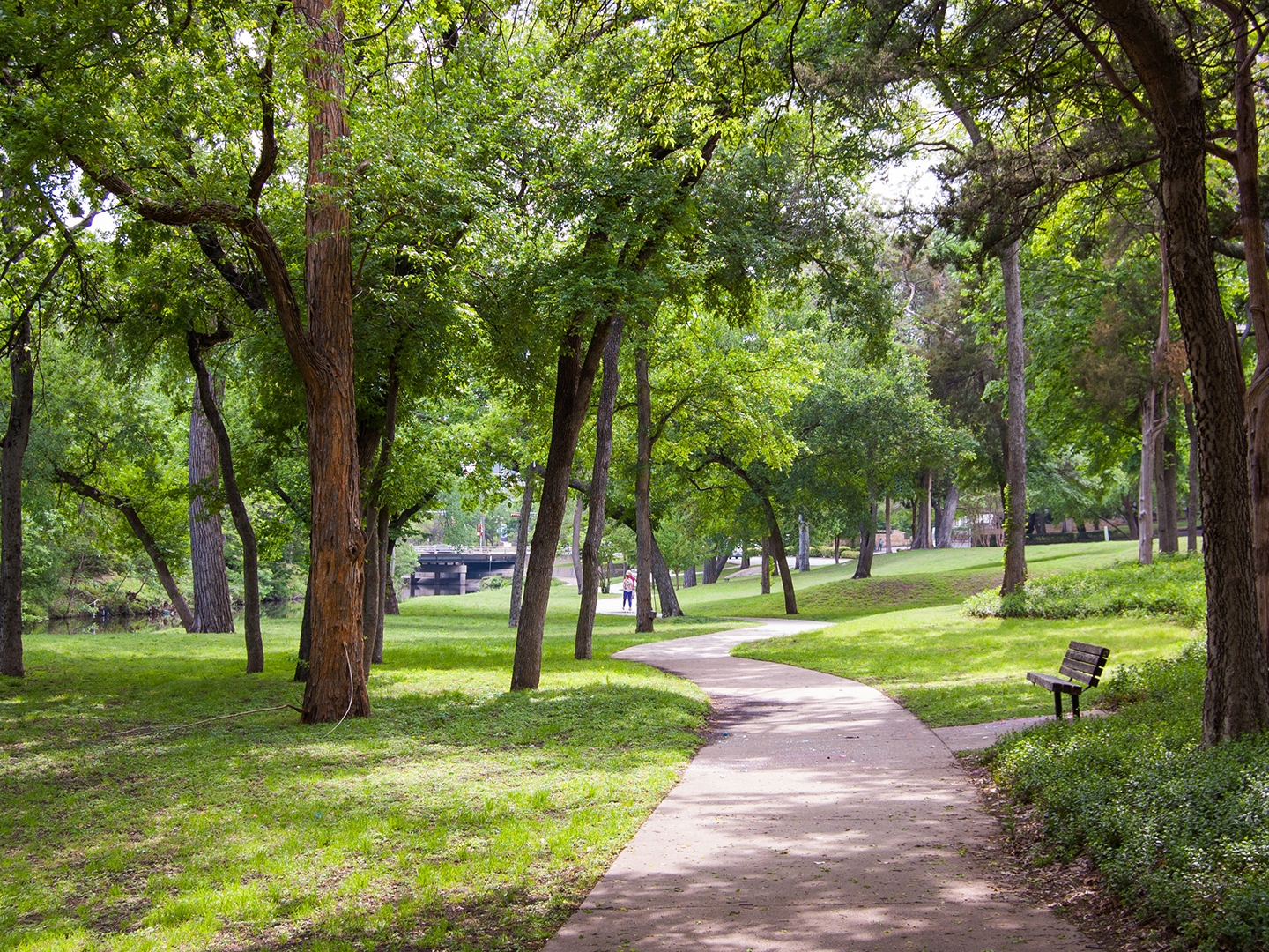 Pathway along with trees at Bergfeld Park near Villages Resort in Flint, Texas.
