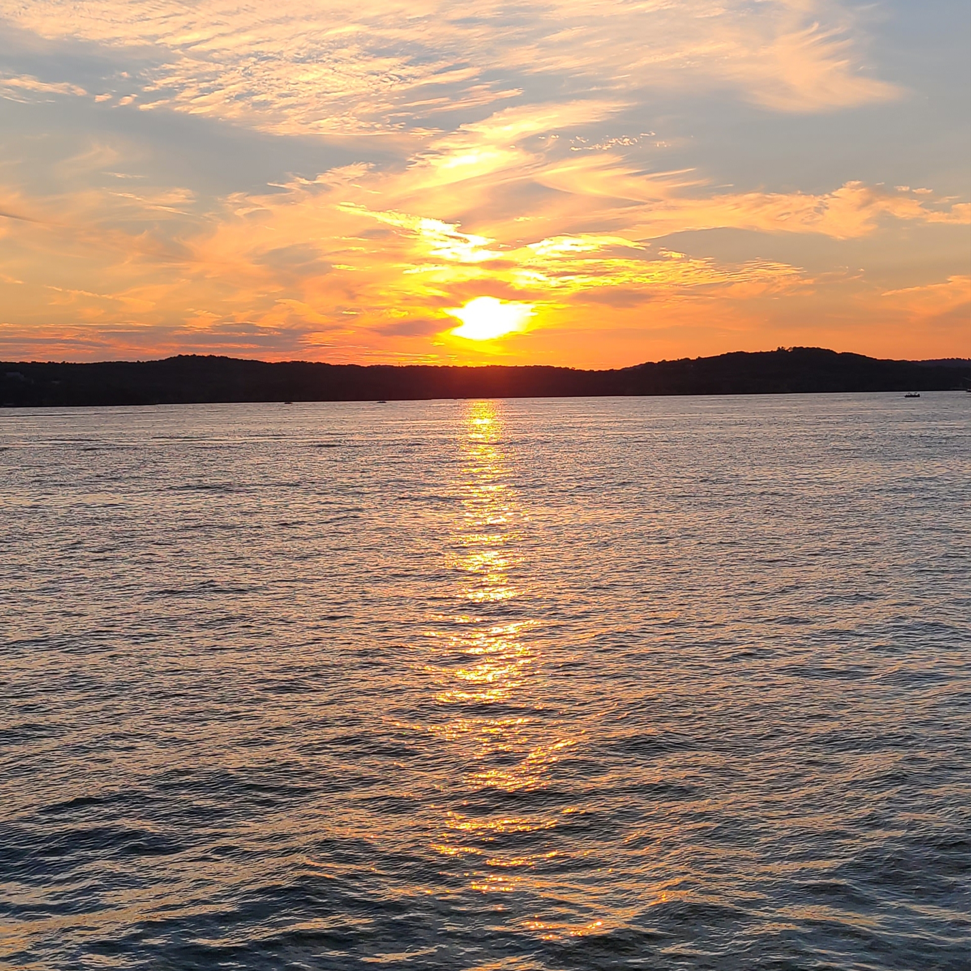 A sunset over a lake.
