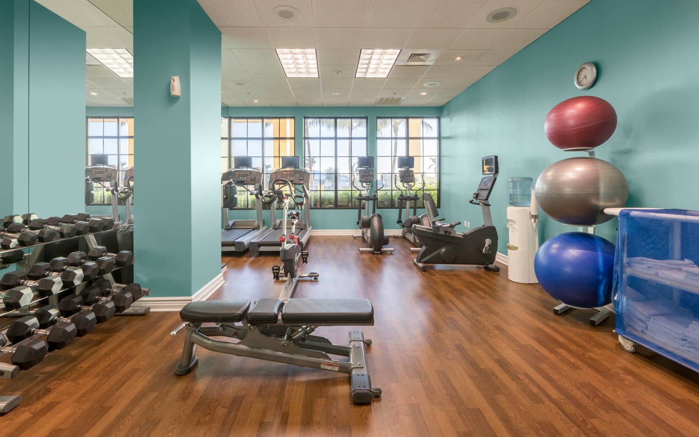Fitness center with treadmills, yoga balls and weights at Sunset Cove Resort in Marco Island, FL.