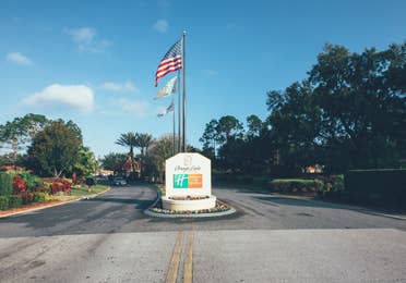 Property sign and entrance to Orange Lake Resort near Orlando, Florida.