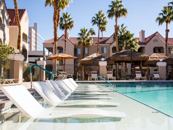 Sun chairs in lounge pool at Desert Club Resort in Las Vegas, Nevada