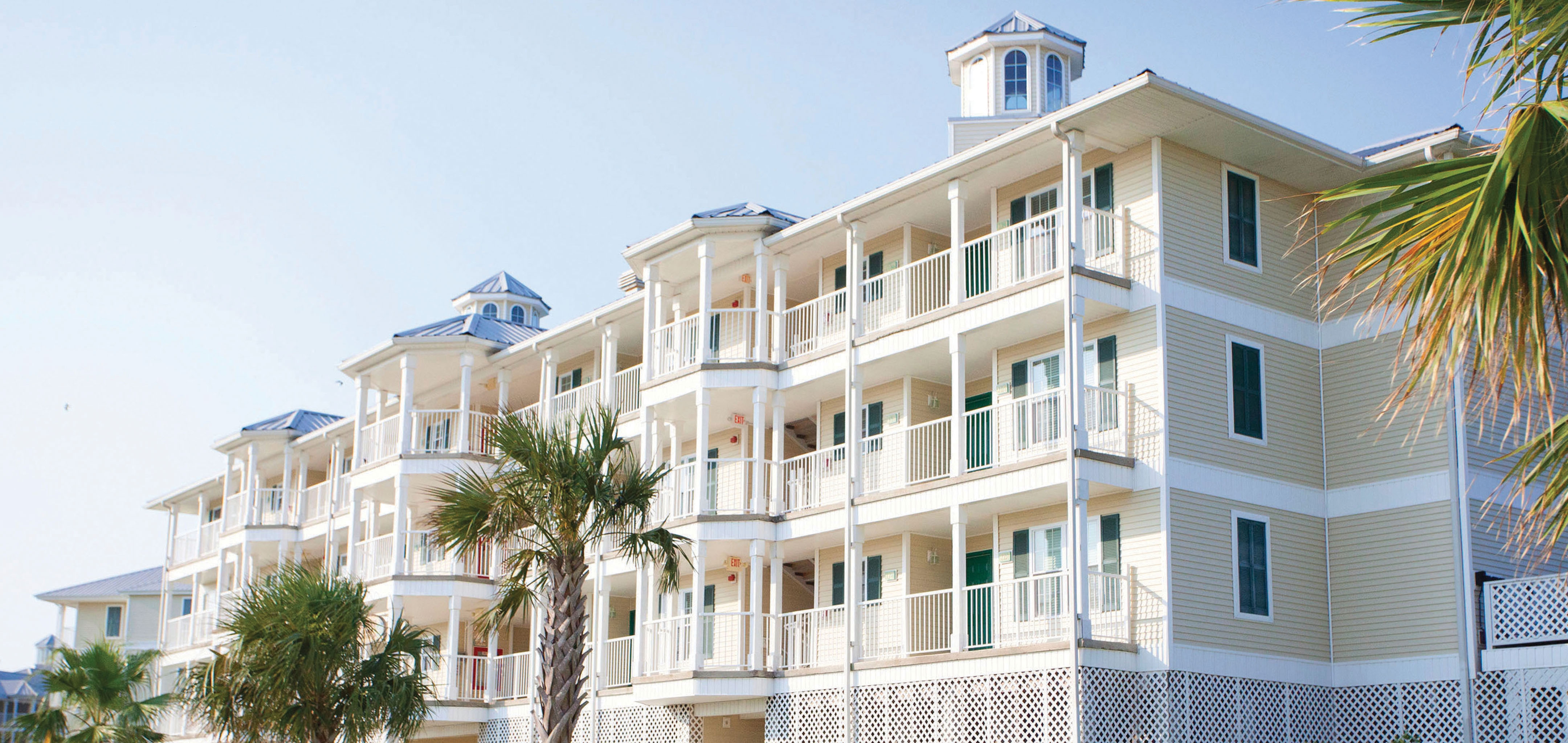 View of property building with balconies at Galveston Seaside Resort in Texas.