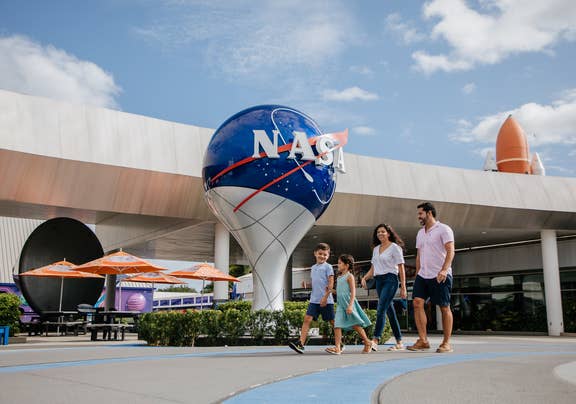 Family of four at the Kennedy Space Center near Cape Canaveral Beach Resort in Florida.