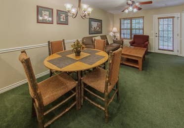 Dining area in a villa at Holly Lake Resort in Holly Lake Ranch, Texas.
