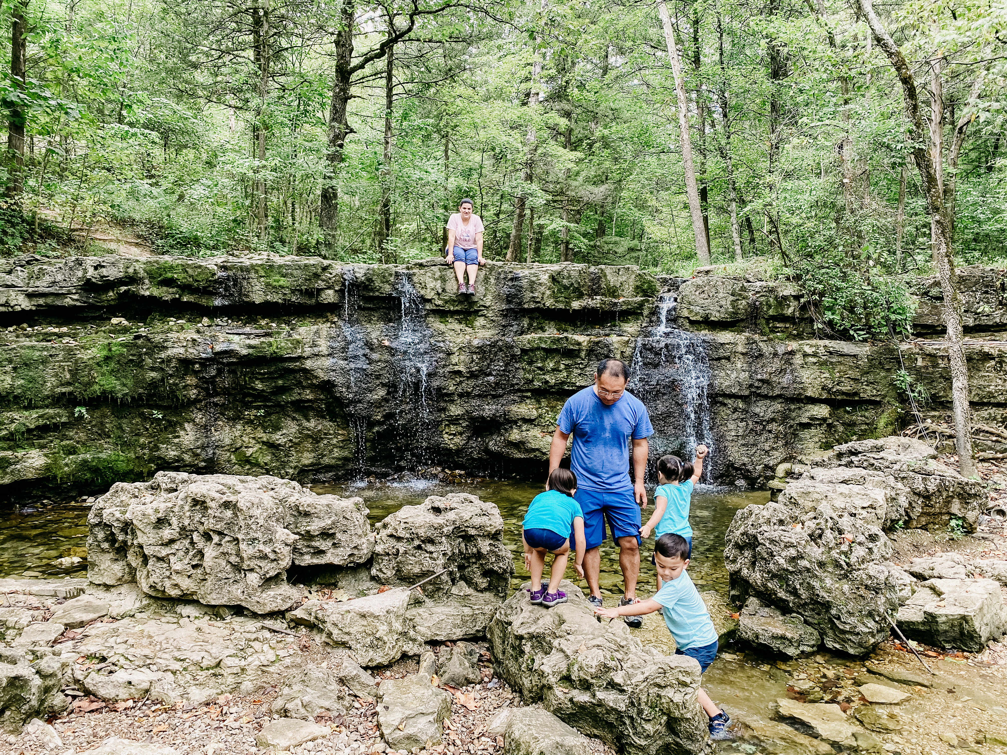 Angelica hiking with her kids.